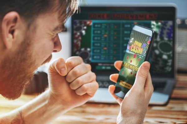 Adult sports fans exploring c77 on a phone with privacy-aware navigation
